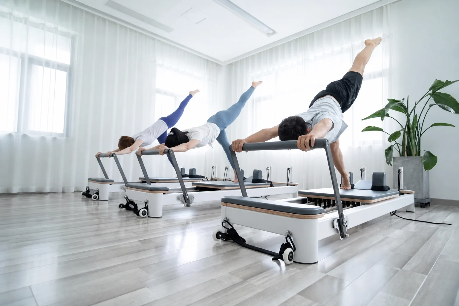 Reformer movement training in a bright studio