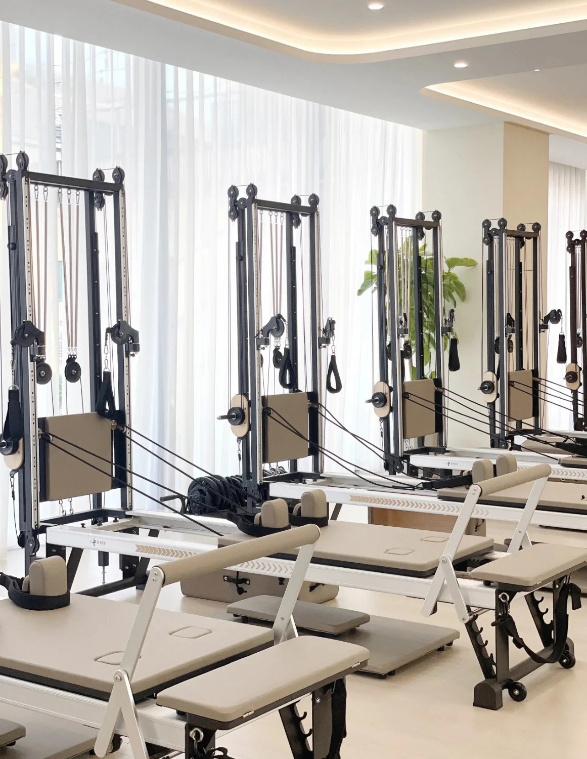 Spiral Tower systems integrated into a modern Pilates studio